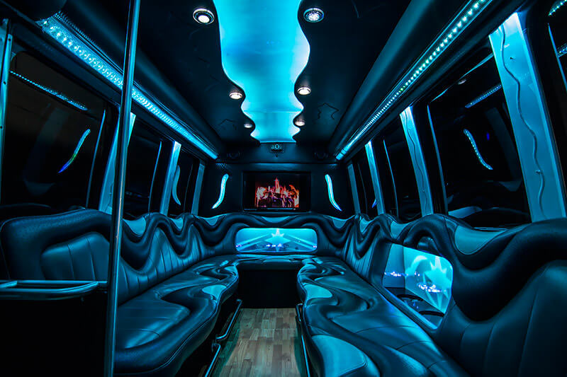 Party bus interior with blue lighting